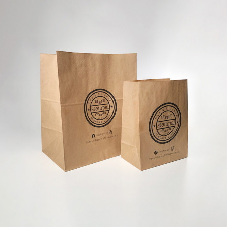 Kraft paper bags with 'Stempel - bar & kitchen' logo