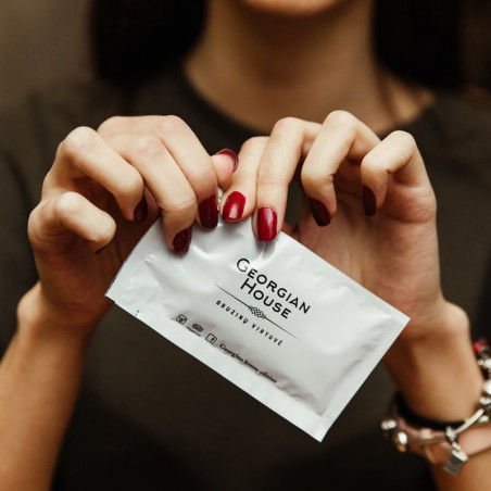 Wet wipes with white triplex surface with 'Georgian House' logo