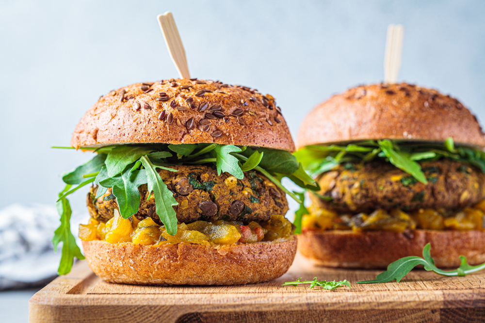 vegan lentil burger with arugula mustard sauce