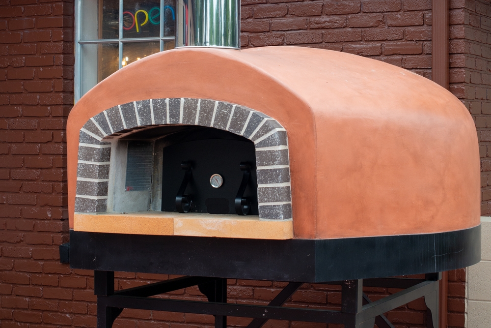 An Exterior Of A Gas Clay Pizza Oven