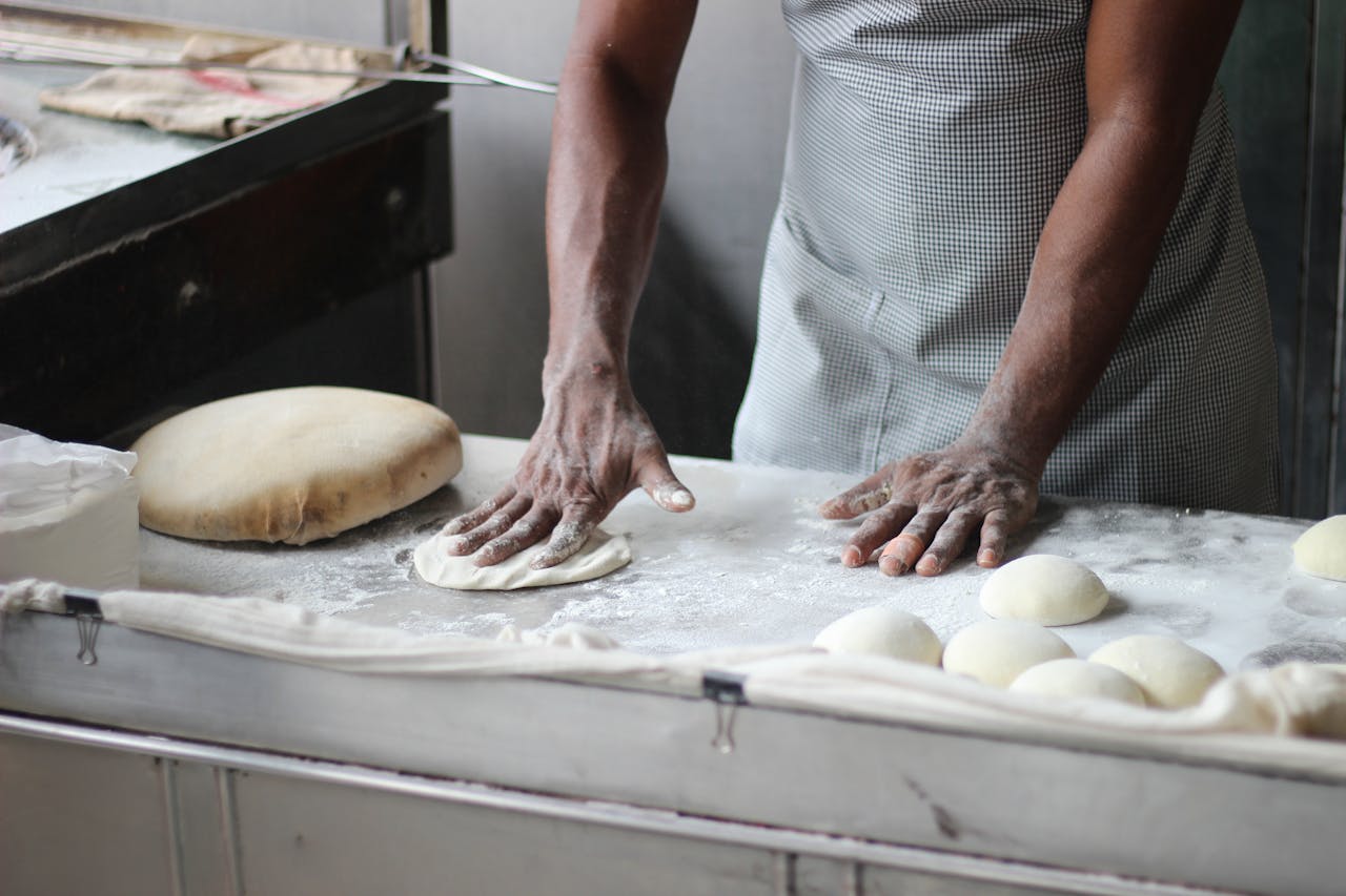 bakery chef baking a dough