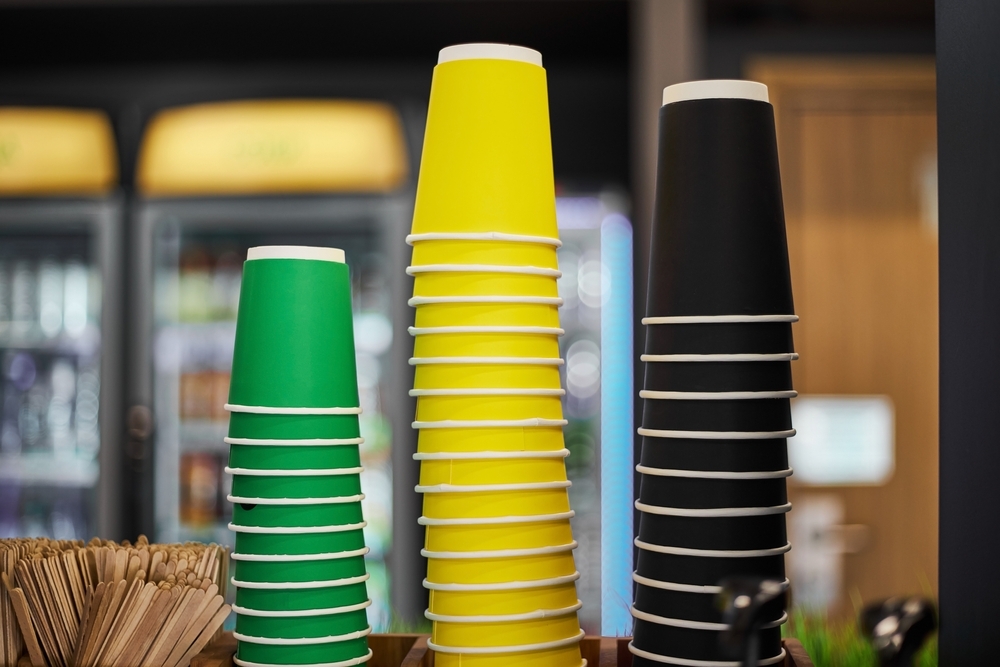 three stacks colored paper cups