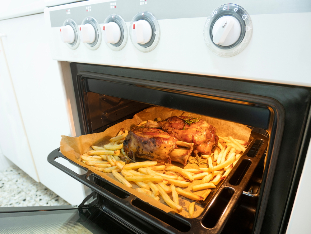 baked pork and chips on greaseproof paper