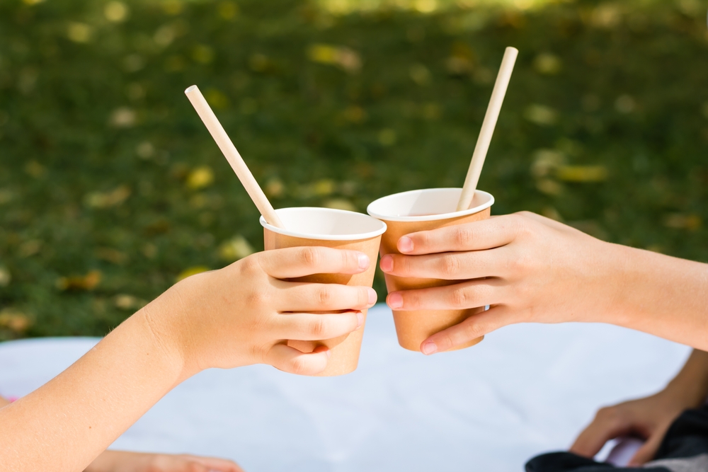 children holding ecofriendly paper cups