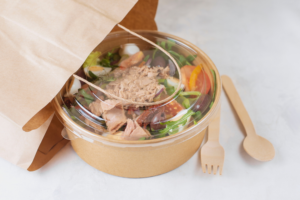 fish diet and salad tuna tomatoes in takeaway pack