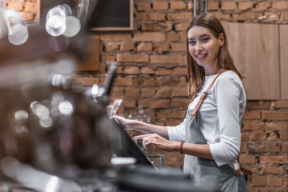 young woman in a coffee and bakery shop